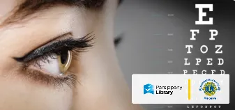 Image of a close up of a woman's eye having an eye exam. 