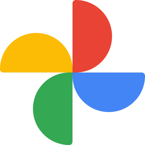 Google Photos Logo-Four half circles are arranged like a flower.  They are red, blue, green and yellow.